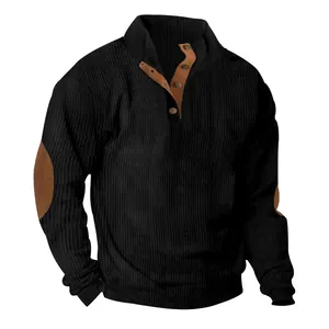 Detailed view of men's black corduroy sweatshirt with stand collar and elbow patches