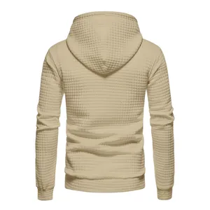 Detailed back view of a beige men's waffle knit textured hoodie for casual spring wear