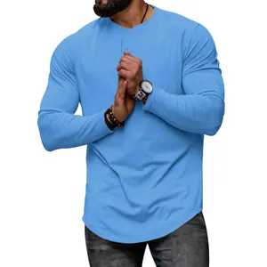 Casual men's long-sleeved crew neck solid light blue T-shirt with stylish curved hem