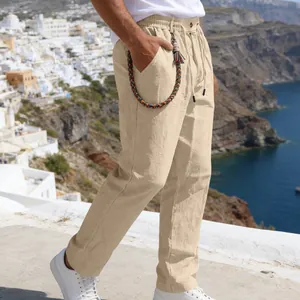 Pantalon décontracté en lin beige pour homme avec cordon de serrage et chaîne décorative