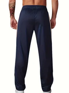 Back view of men's navy blue athletic sweatpants with white side stripes for gym