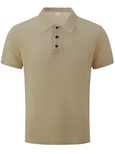 Macro detail of men's polo shirt with textured waffle knit fabric and buttons