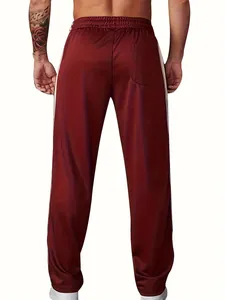 Back view of men's dark red sports sweatpants with white side stripes for gym and running