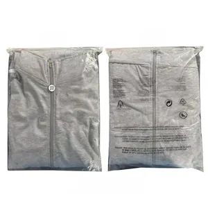 Detail view of multi-language suffocation warning printed on clear plastic bag packaging