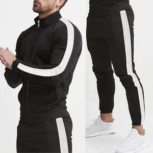 Detailed view of a men's slim fit black tracksuit featuring side stripes and stand collar