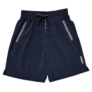 Dark blue men's sports shorts with drawstring and reflective zipper pockets detail