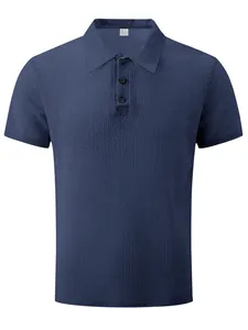 Detail view showing the premium waffle texture and button placket of this men's polo shirt.