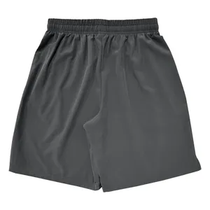 Rear view of loose-fit men's dark grey sports shorts with elastic waistband detail