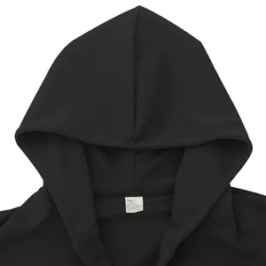 Close-up of black hooded jacket collar showing fabric and size label details.
