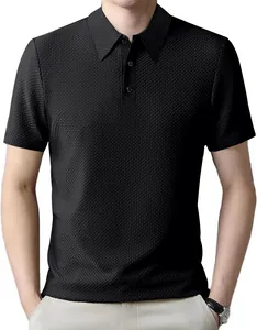Close-up of black textured men's Polo shirt with honeycomb pattern fabric