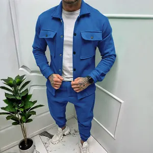 Men's blue suede sports suit featuring a collared jacket and casual jogger pants.