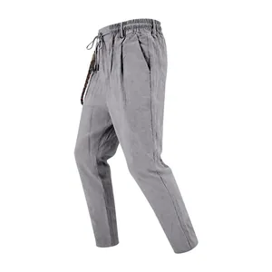 Vue détaillée de profil d'un pantalon en lin gris respirant pour hommes avec cordon de serrage