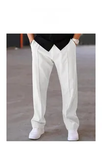 Front view of men's white casual straight-leg pants with pleat details on model