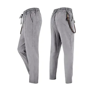 Pantalon en lin gris respirant pour homme avec cordon et accessoire tressé ethnique