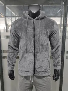 Detailed front view of a grey fuzzy fleece hooded zip-up jacket on a male mannequin