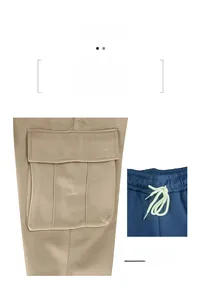 Detail of men's casual cargo pants showing a large pocket and drawstring waistband.