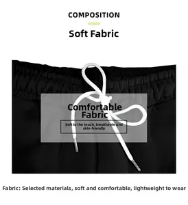 Detail of men's black jogger waistband with white drawstring and soft fabric texture.
