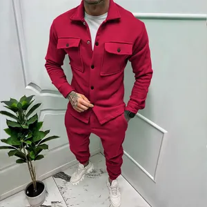 Close-up view of men's burgundy suede two-piece tracksuit set with jacket and jogger pants