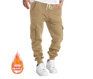 Men's slim fit fleece-lined cargo sweatpants featuring multi-pockets and ribbed cuffs