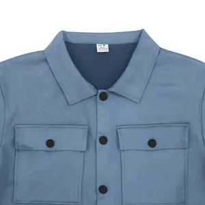 Close-up macro view of blue suede jacket collar and pockets showing fabric texture