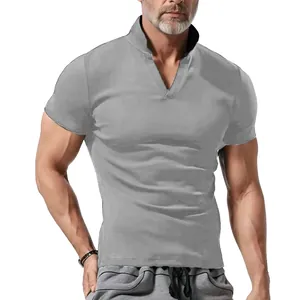 Close-up of grey waffle knit men's Polo shirt with a modern V-neck collar design