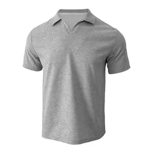 Detail view of a grey men's waffle knit polo shirt featuring a stylish V-neck design.