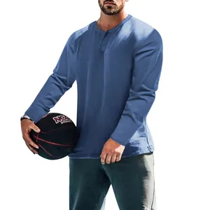 Minimalist men's casual solid blue long-sleeved Henley shirt for spring and autumn