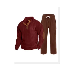 Detail view of men's burgundy waffle knit sweatshirt and brown drawstring trousers set