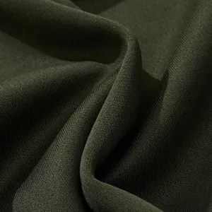Detailed texture of heavyweight dark olive green knit fabric for men's sweatshirts