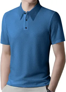Close-up detail of men's blue short sleeve polo shirt showing the waffle knit texture