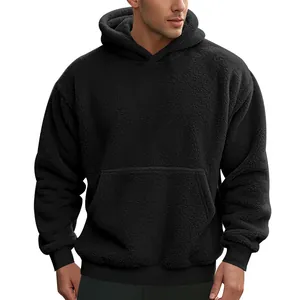 Detailed view of heavy men's black sherpa fleece oversized hoodie with kangaroo pocket