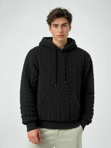 Detailed view of men's black cable-knit fleece hoodie showing soft warm jacquard texture