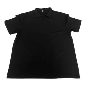 Macro detail of men's black waffle knit polo shirt featuring v-neck design and soft texture