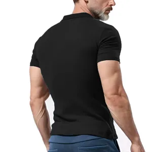 Detailed back view of a men's slim fit black waffle knit short sleeve polo shirt on model