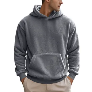 Thick grey fleece pullover hoodie for men with cozy kangaroo pocket for winter.