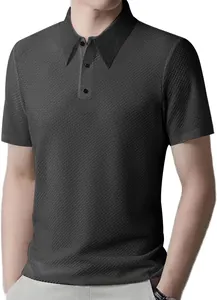 Close-up detail of a dark grey men's polo shirt with honeycomb waffle texture.