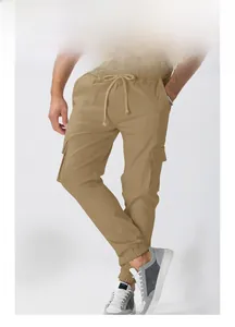 Detail view of men's khaki cargo pants featuring drawstring waist and multiple pockets