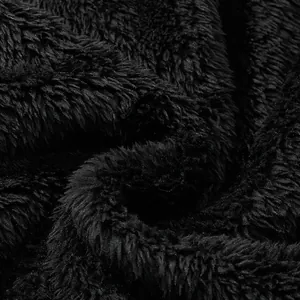 Detailed close-up showing the soft black fuzzy fleece texture of a warm winter jacket fabric
