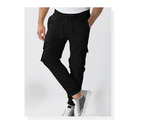 Full view of men's black cargo jogger pants with drawstring and multi-pockets