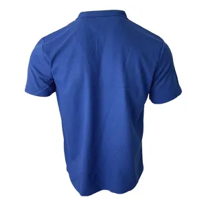 Back view of a blue waffle knit men's polo shirt showing premium textured fabric detail