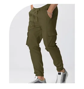 Detailed close-up of men's olive green cargo joggers with drawstring and pockets