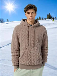 Men's warm brown fleece hoodie with cable-knit jacquard texture in snow setting.