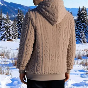 Detailed back view of men's warm cable-knit fleece hoodie set against a snowy landscape