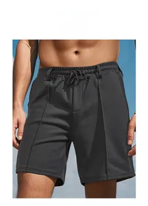 Detailed view of men's breathable dark grey athletic shorts for gym and summer running
