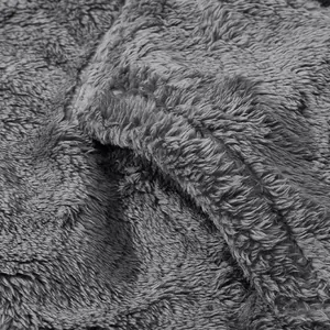 Macro detail showing the soft and dense gray fleece texture of the winter warm jacket.