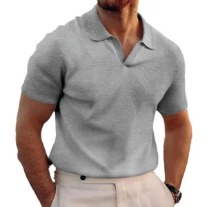 Premium men's grey waffle knit polo shirt featuring a stylish V-neck lapel design
