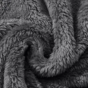 Macro detail shot of soft grey fuzzy fleece material for warm autumn winter hoodie