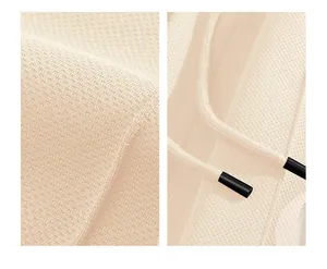 Close-up of breathable knit fabric and adjustable drawstring on sports shorts