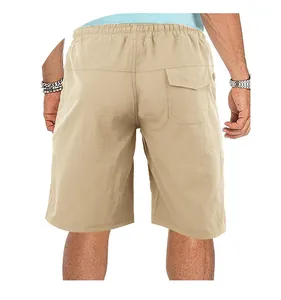 Detail view showing the back of men's khaki loose cargo shorts with elastic waistband