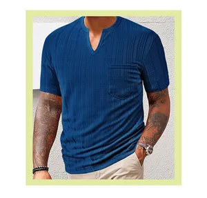 Detail view of men's blue Henley shirt with vertical stripe texture and chest pocket detail.
